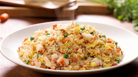   ¡Conque te atreves con el Yangzhou Fried Rice de la Ciudad de Anhui? Una explosión de sabores salados y umami en cada bocado!