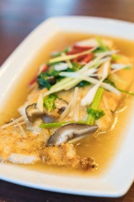  ¿Sabías que el Pescado Asado con Salsa de Soja y Ajo del Qinhuangdao es un manjar marino que te transportará a las costas chinas?